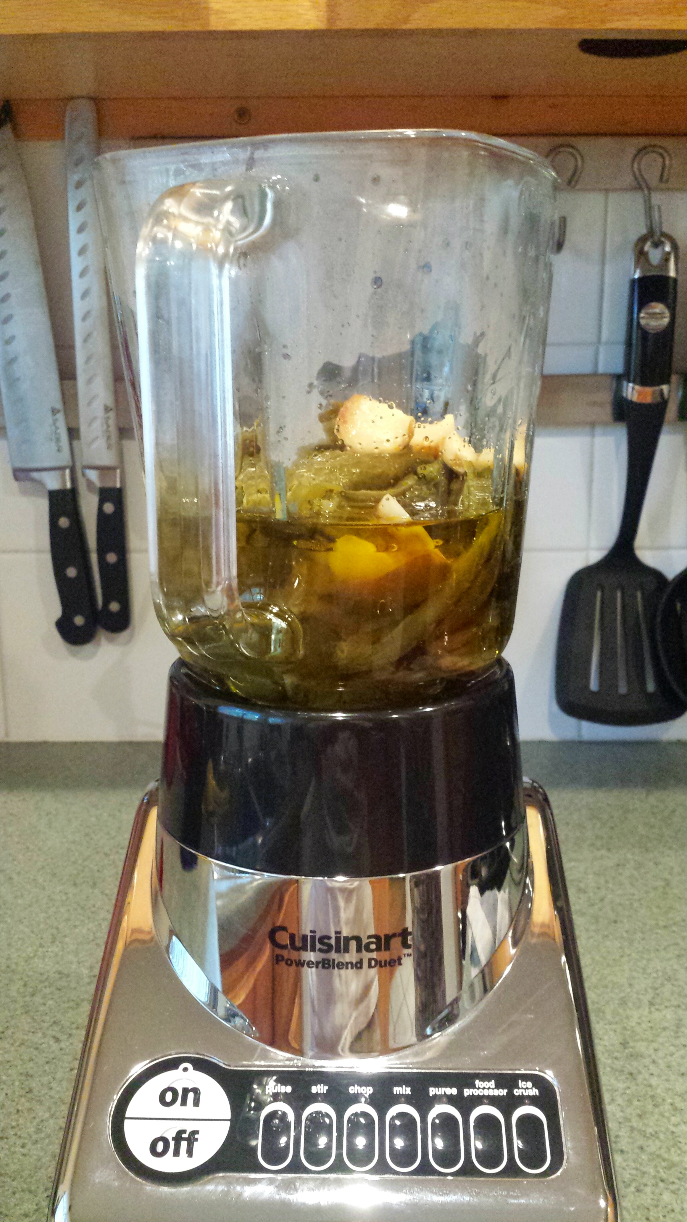 Peppers, garlic & olive oil in blender.