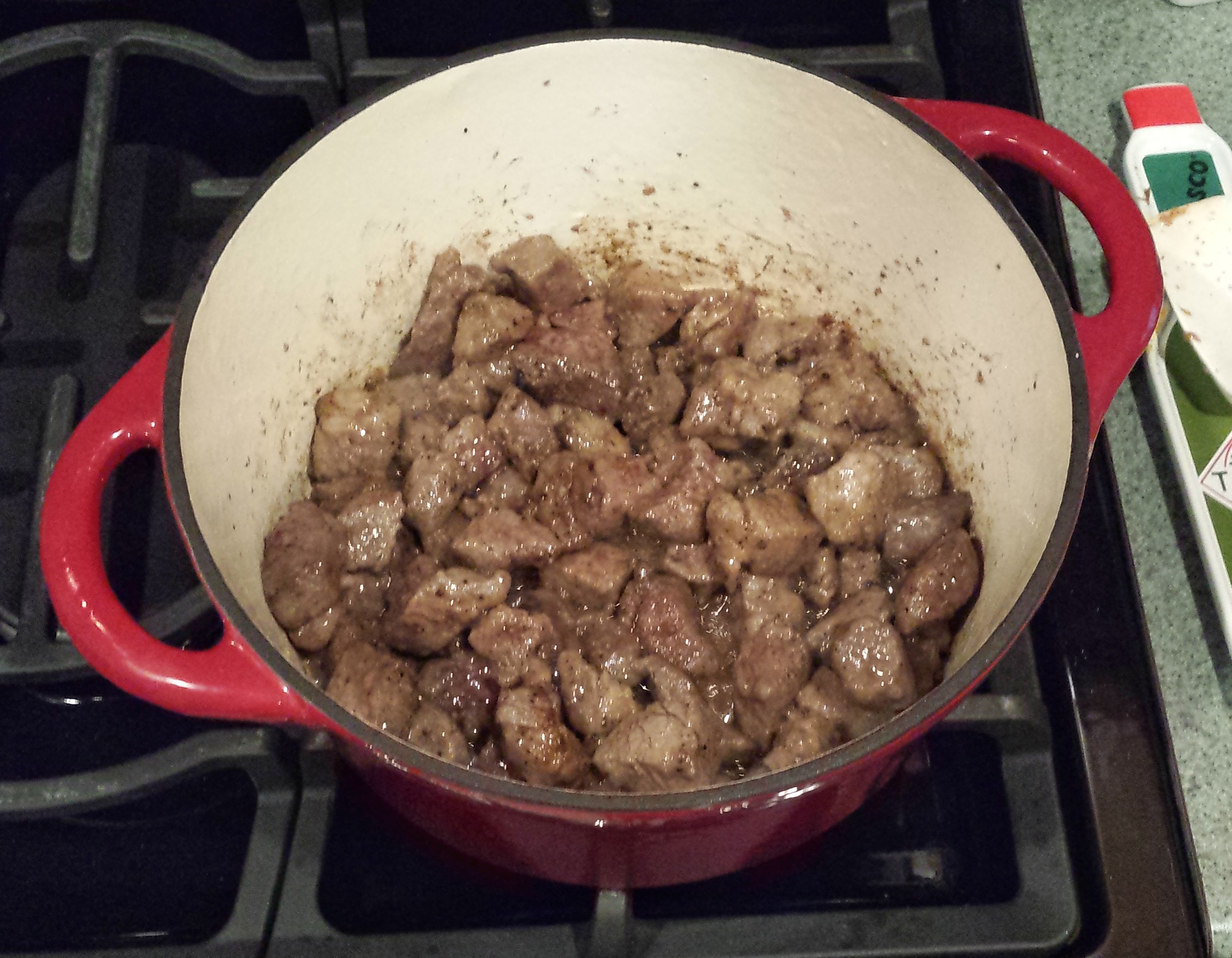 Stew beef browning in dutch oven